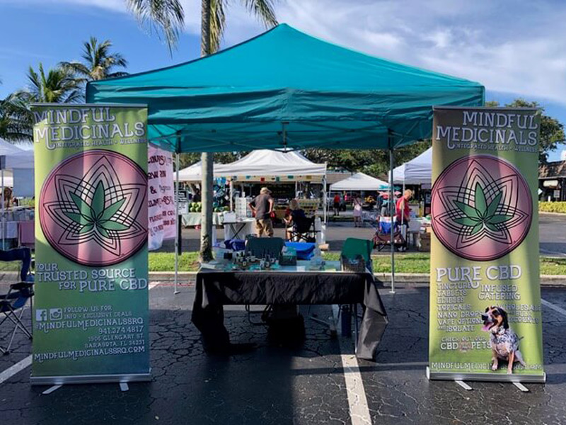 CBD Stand at local Farmers Market - Mindful Medicinals Sarasota CBD Dispensaries